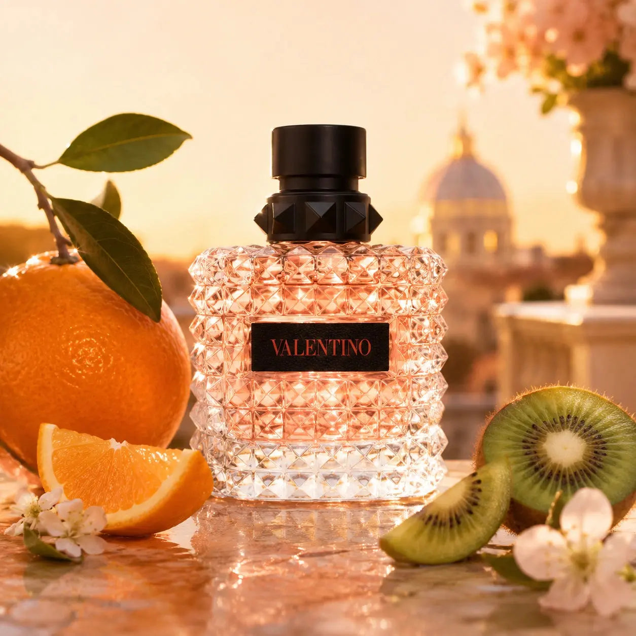 Valentino Donna Born In Roma Coral Fantasy Eau de Parfum bottle in a golden luxury setting at Gadgets Online NZ