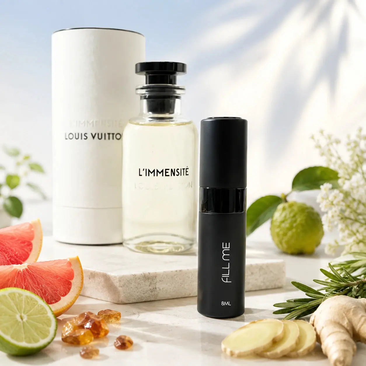 Louis Vuitton L'Immensité 8ml decant main hero image with Fill Me atomiser, full-size reference bottle and box, grapefruit, bergamot, ginger, rosemary and fresh aromatic notes at Gadgets Online NZ
