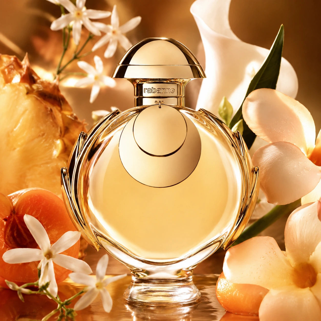 Rabanne Olympéa Elixir EDP Intense 80ml top notes inspired image with radiant golden tones and fruity floral freshness.
