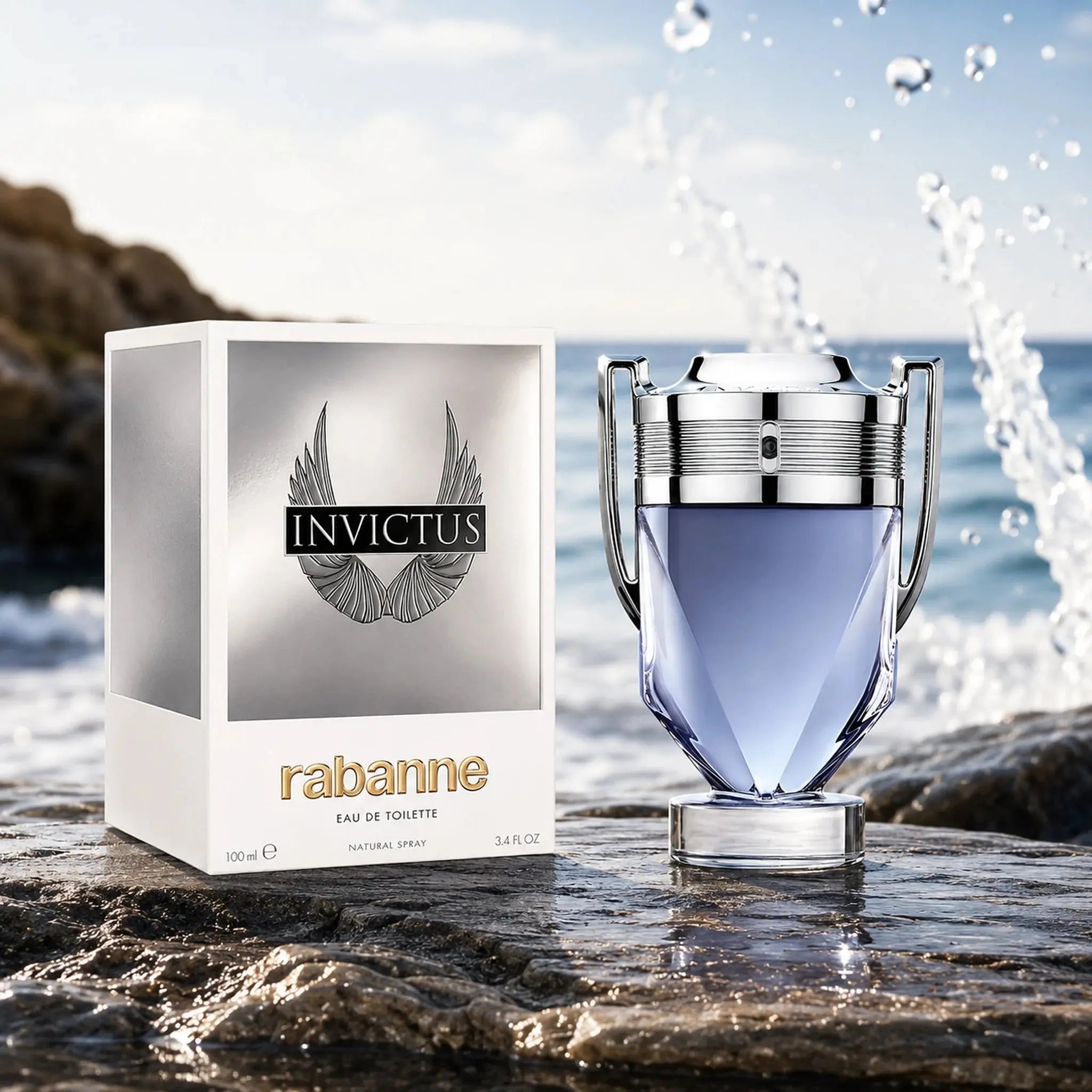 Invictus Rabanne perfume bottle and packaging on a rocky surface with water in the background
