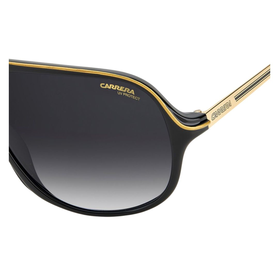 Side look Carrera Safari65/N unisex aviator sunglasses with black gradient lenses and gold frame on a white background