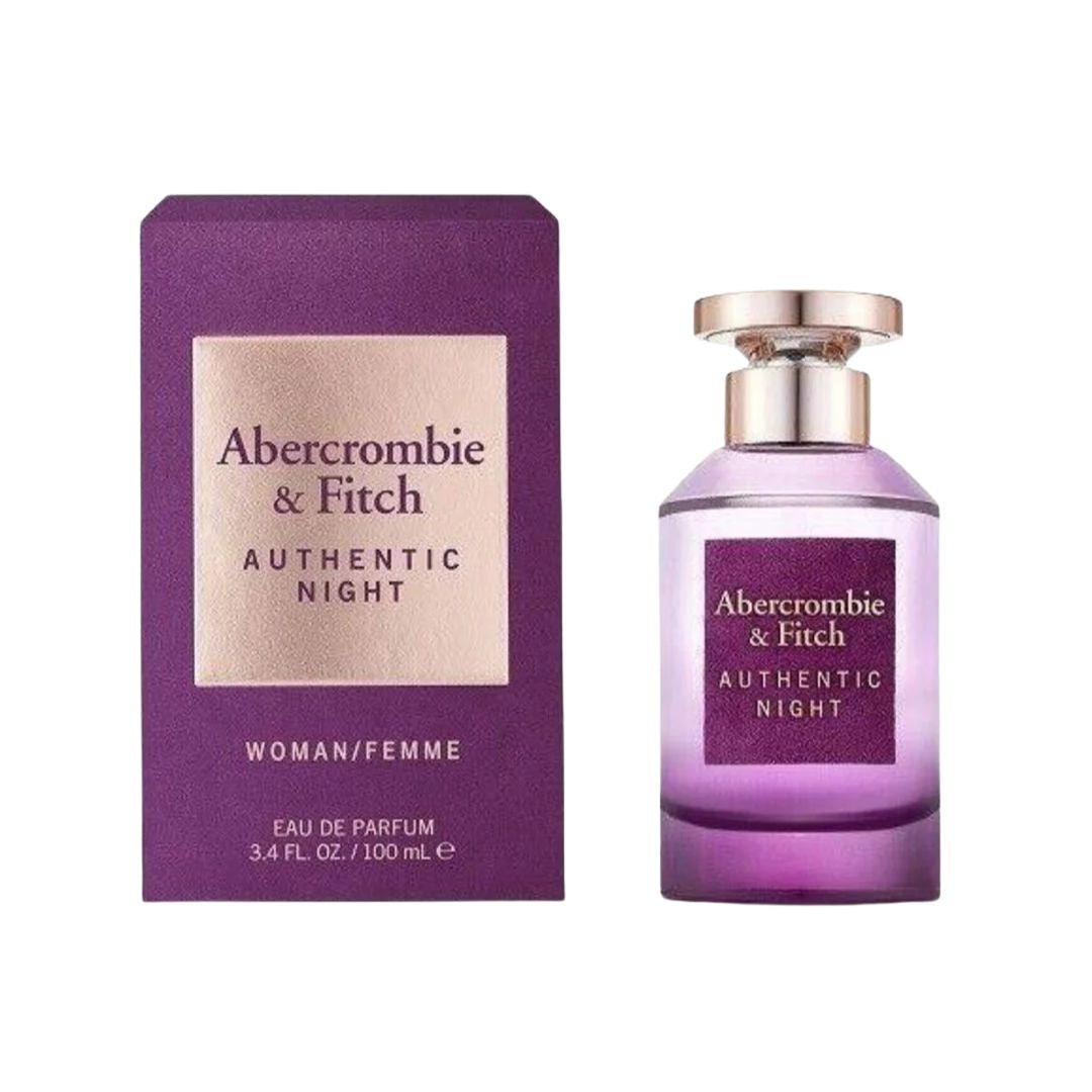 Abercrombie & Fitch Authentic Night Woman 100ml EDP, a sleek, clear bottle with a metallic cap, suggesting a vibrant, floral, and woody feminine fragrance.