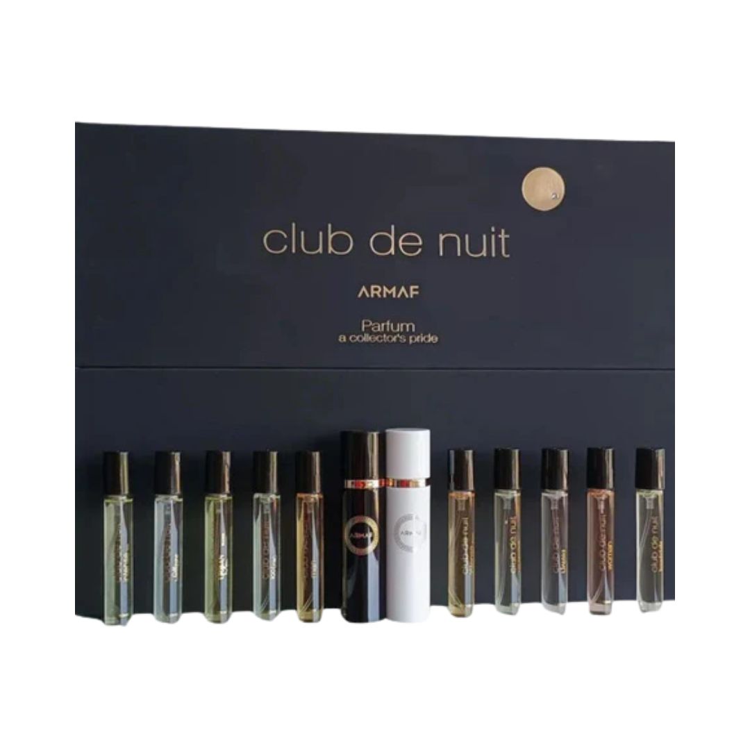Armaf Club De Nuit Parfum Collector's Pride Discovery Set, a sophisticated black and silver box containing ten 10ml fragrance sprays and two refillable aluminum travel cases, suggesting a diverse collection of intense unisex perfumes.