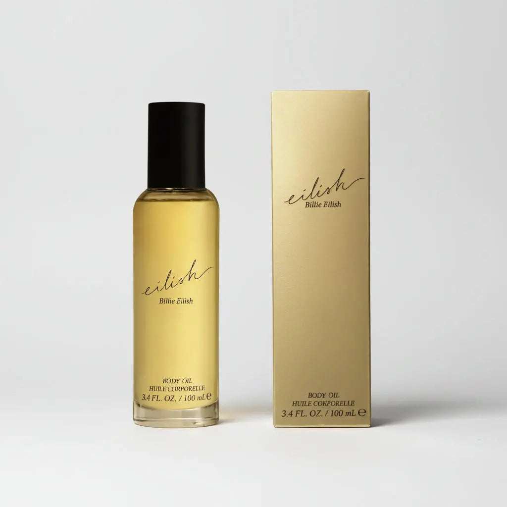 Billie Eilish Eilish Body Oil 100ml, a sleek bottle containing a nourishing vanilla and cocoa scented body oil for a radiant skin glow.