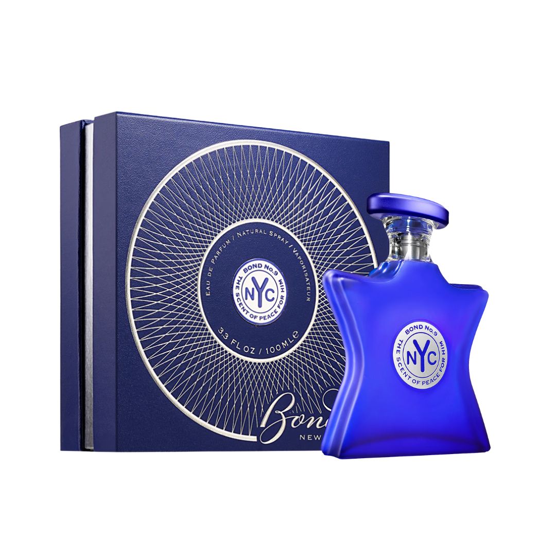 Bond No. 9 The Scent of Peace For Him 100ml EDP, a dark green bottle with a peace sign, suggesting a fresh, woody, and aromatic masculine fragrance.