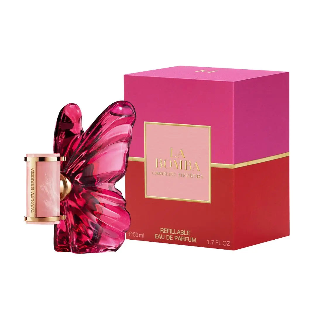 La Bomba Refillable Eau de Parfum 50ml bottle with a butterfly-shaped pink glass body, shown next to its pink and red packaging box with gold lettering.