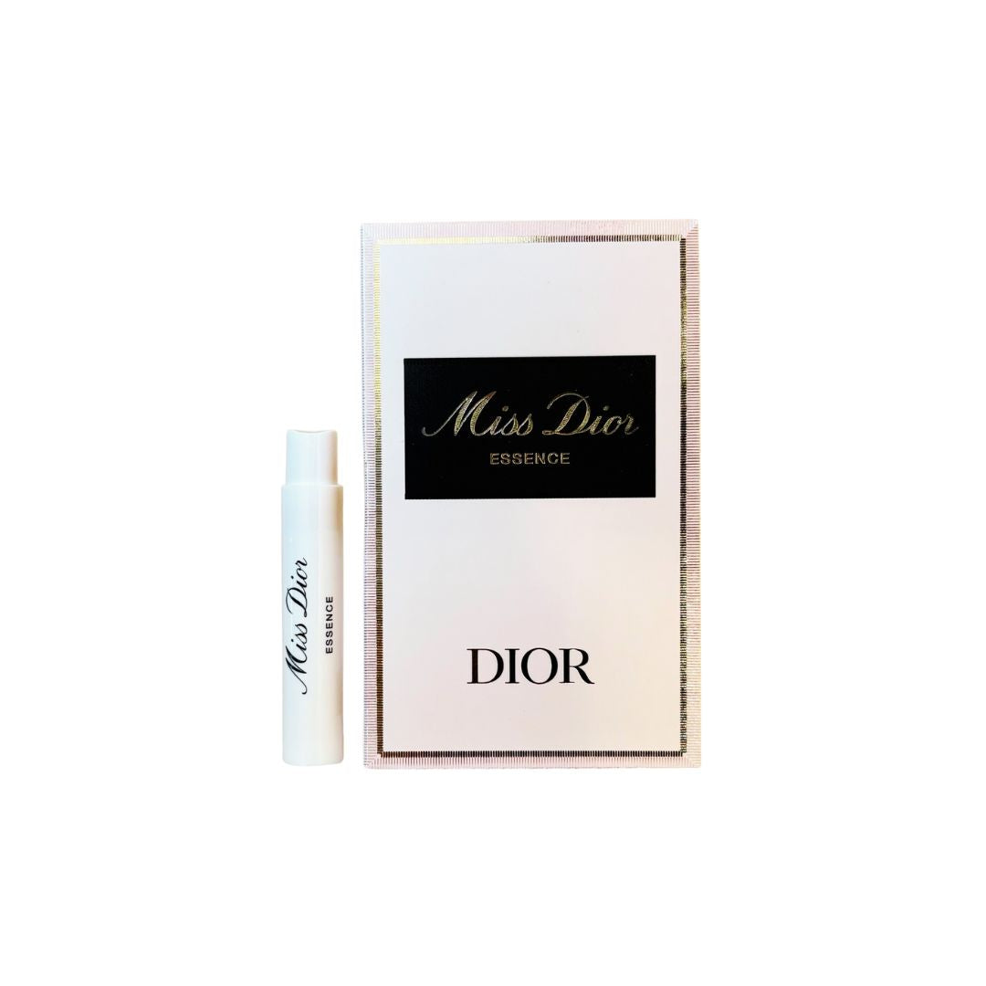 Christian Dior Miss Dior Essence 1ml vial suggesting a sweet, floral, and woody feminine fragrance.