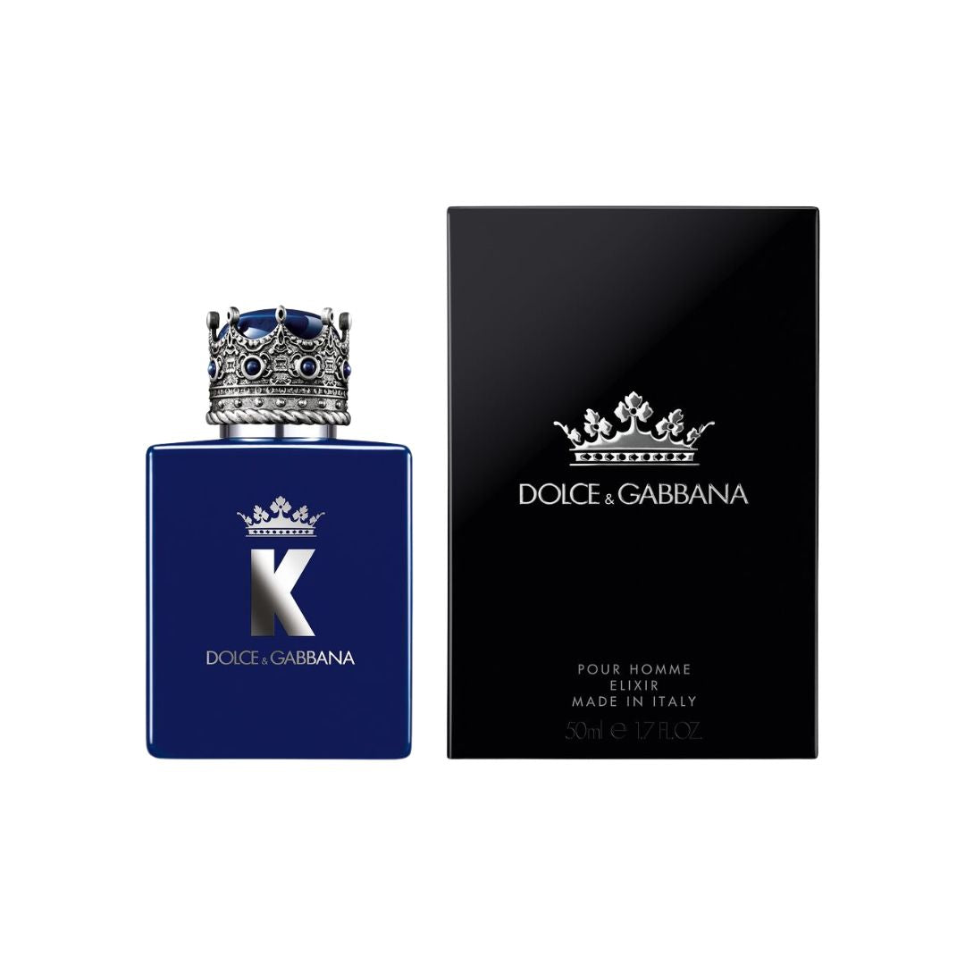 Dolce & Gabbana K Elixir 50ml, deep blue lacquered bottle with a silver crown cap, featuring a woody amber scent with incense and cinnamon.