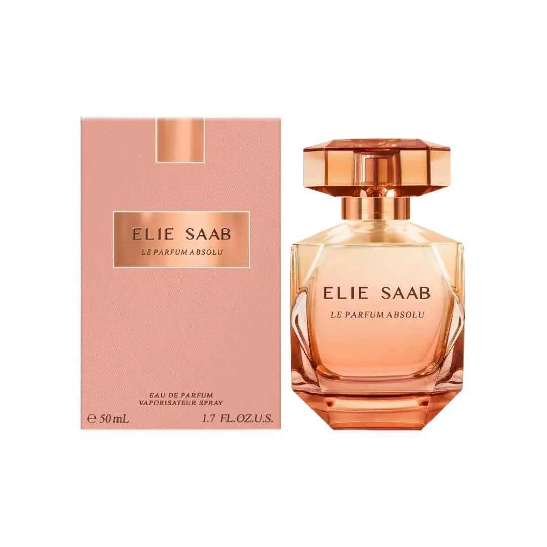 Elie Saab Le Parfum Absolu 50ml eau de parfum spray bottle and its matching pink packaging box, both featuring a faceted rose-gold cap and a peachy-pink liquid inside.