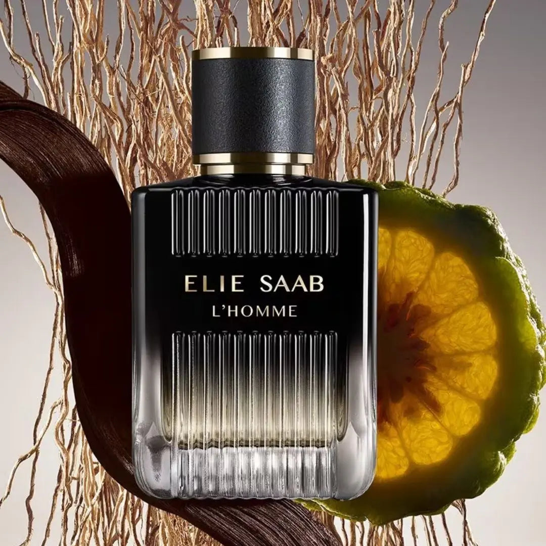 Elie Saab L'Homme perfume bottle with decorative elements on a neutral background