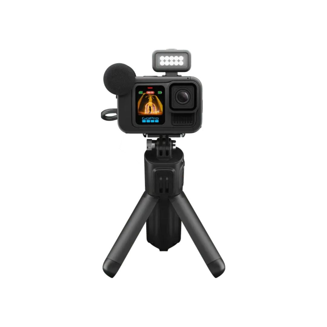 GoPro Hero13 Creator edition Action camera with microphone and light on a tripod stand against a white background