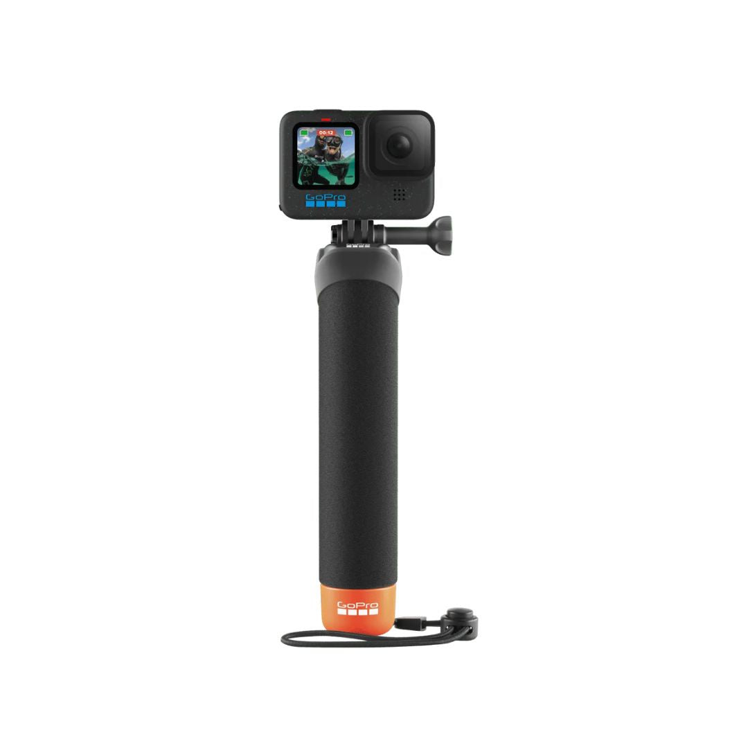 GoPro The Handler, a floating hand grip for GoPro cameras with an orange cap and wrist strap.