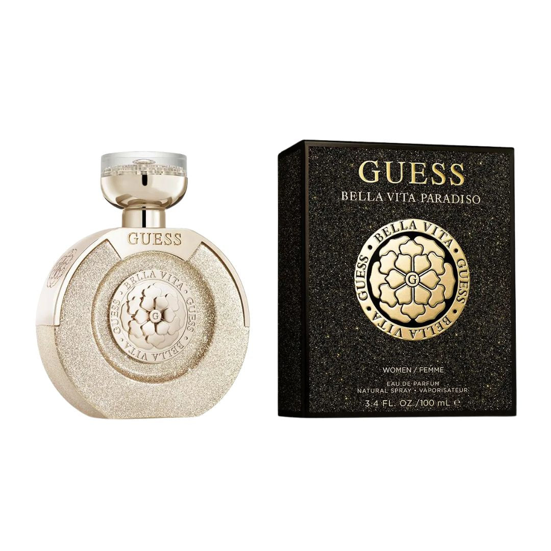 Guess Bella Vita Paradiso 100ml EDP, a sleek gold bottle with a bold design, suggesting a lush, fruity, and opulent floral feminine fragrance.