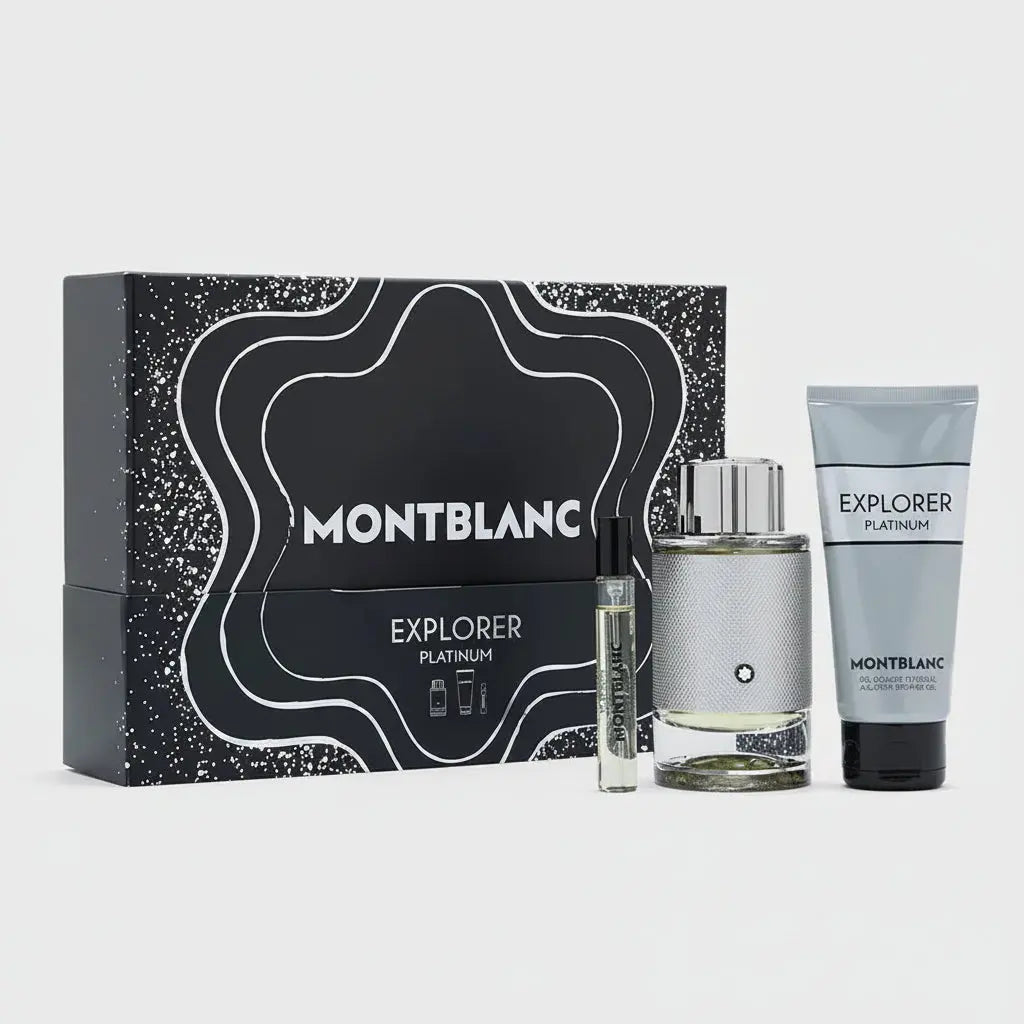 Montblanc Explorer Platinum fragrance gift set with a black patterned box, a silver-toned perfume bottle, a small sample vial, and a matching body care tube on a light gray background.