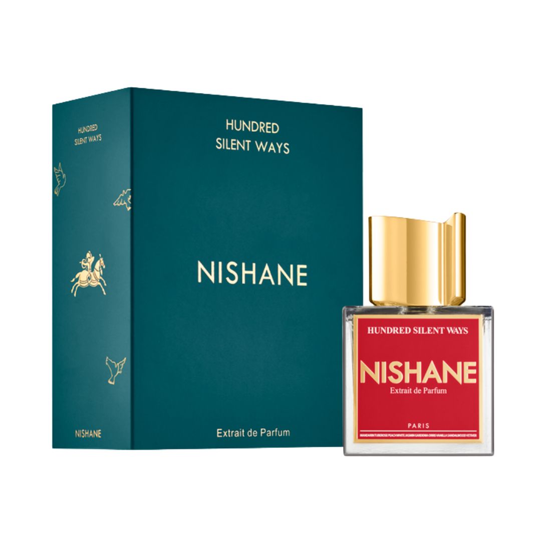 Nishane Hundred Silent Ways Extrait De Parfum 100ml, a sophisticated clear glass bottle with a black and gold label, suggesting a rich, warm, creamy tuberose and vanilla oriental-floral scent.