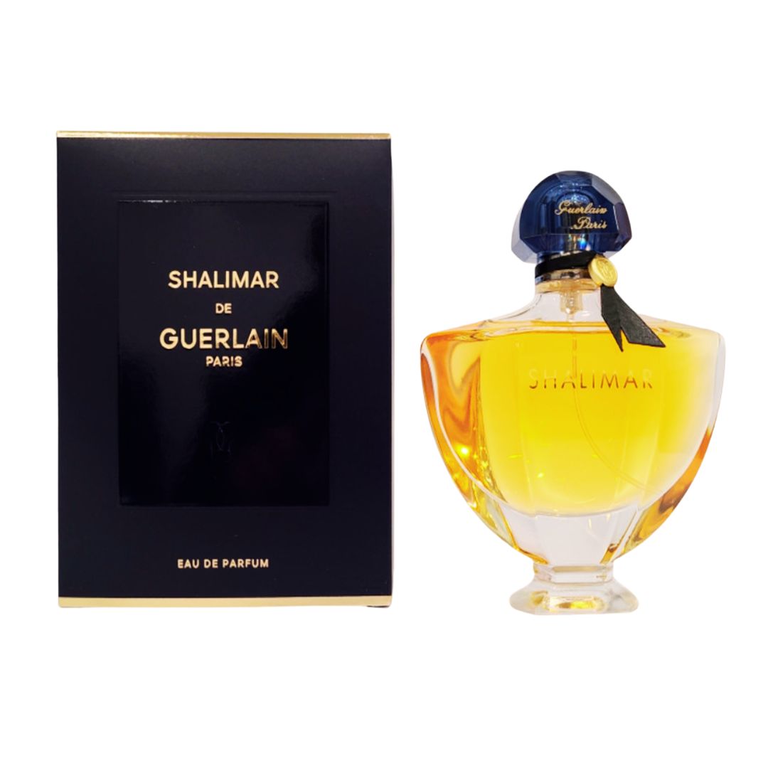 Shalimar de Guerlain perfume bottle and packaging on a white background