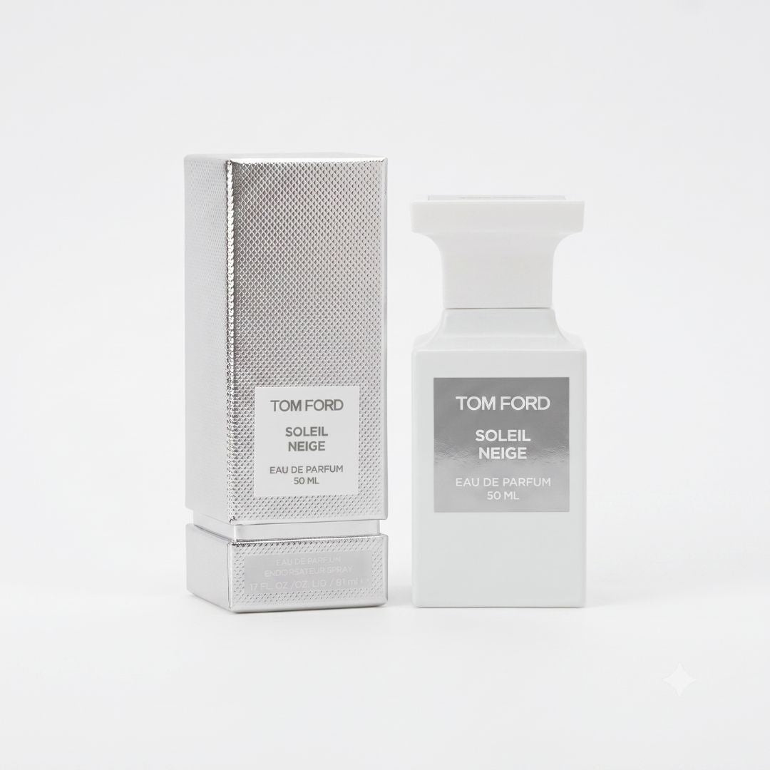 Tom Ford Soleil Neige Eau de Parfum 50ml bottle next to its textured silver packaging box, set against a clean white background.