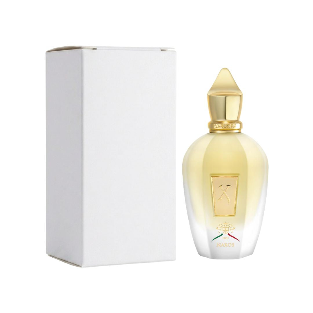 A bottle of Xerjoff Naxos EDP 100ml Tester perfume with a gold cap and pale yellow liquid, shown next to its white rectangular box on a white background.