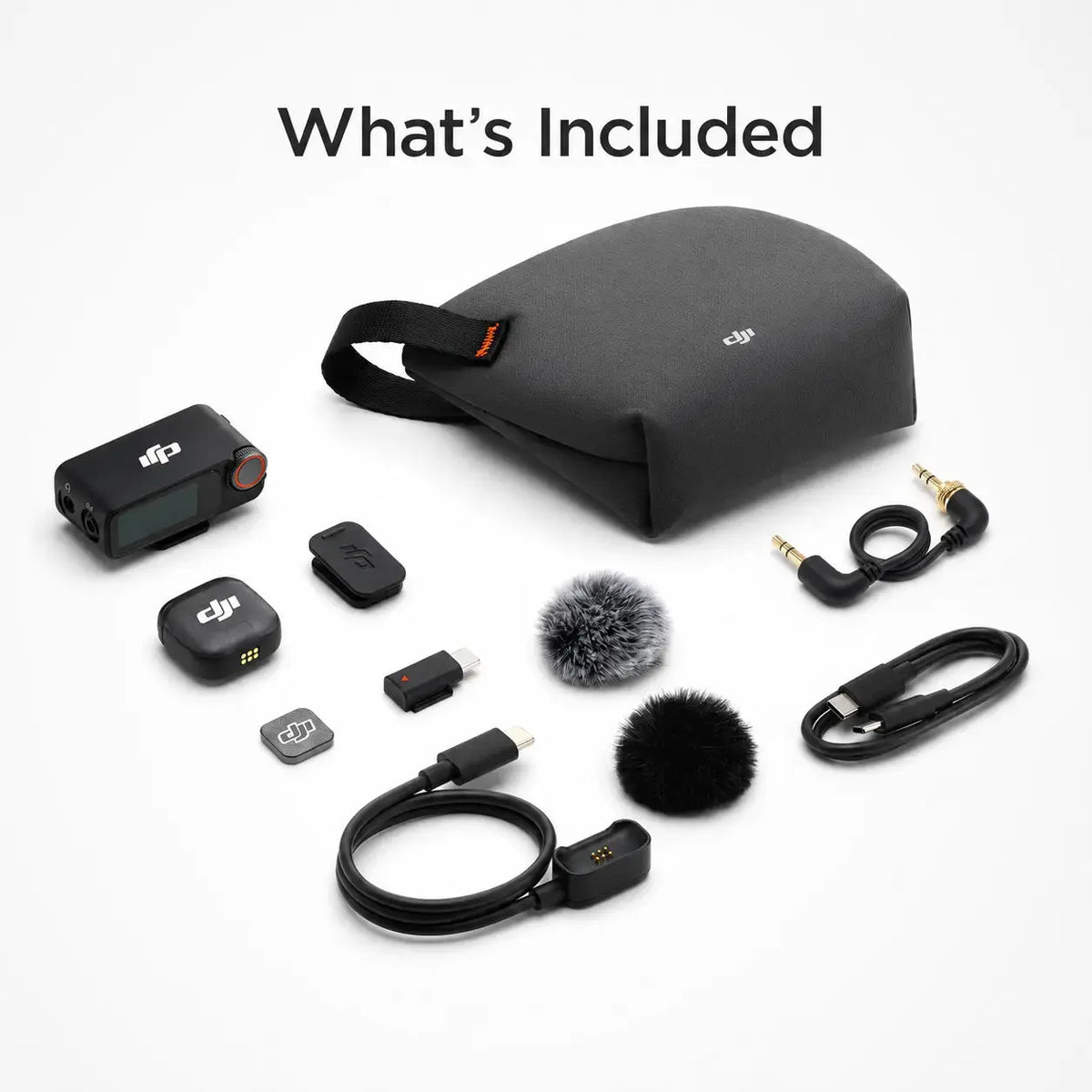 Collection of camera accessories including a carrying case on a white background