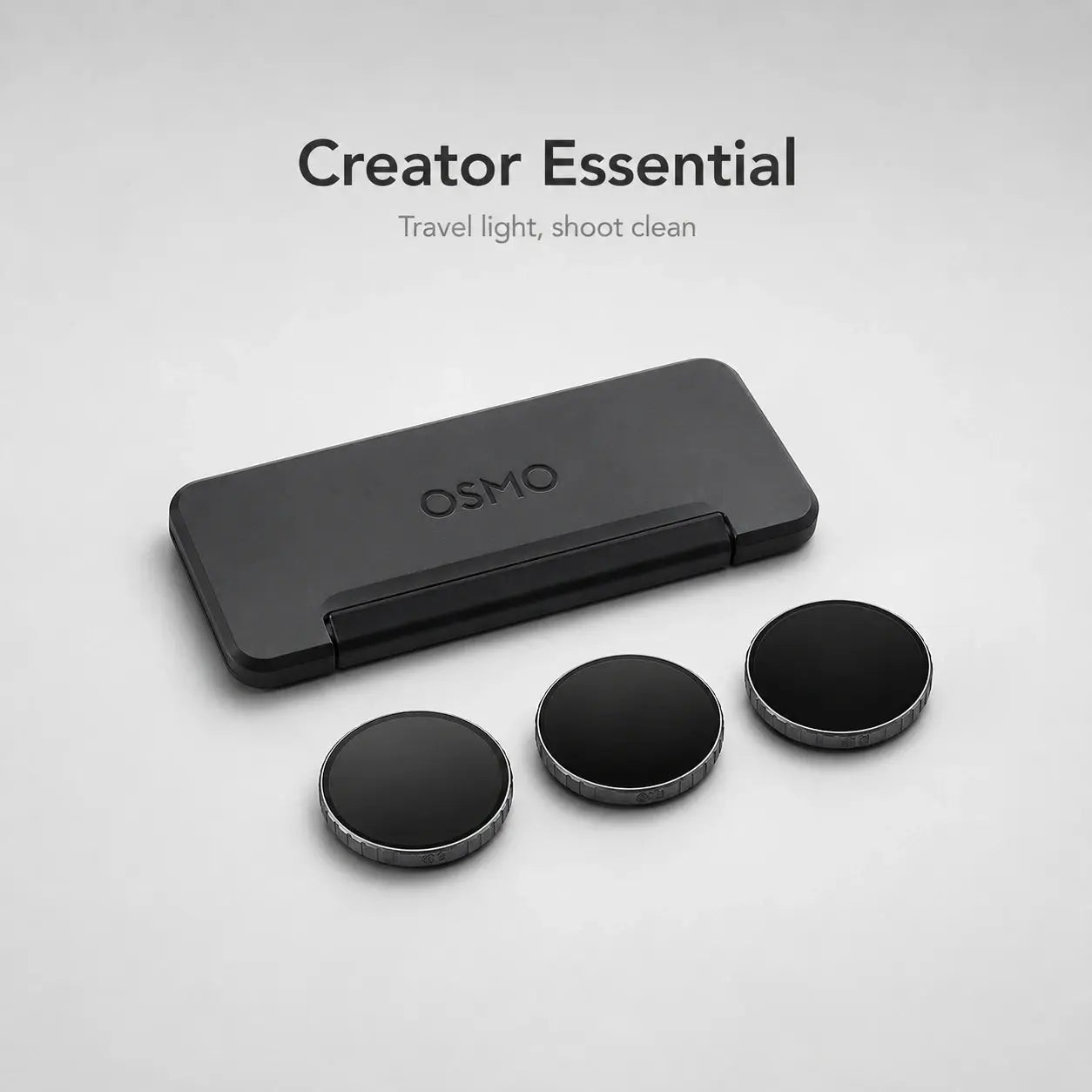 OSMO travel cleaning kit with three black circular filters on a light gray background