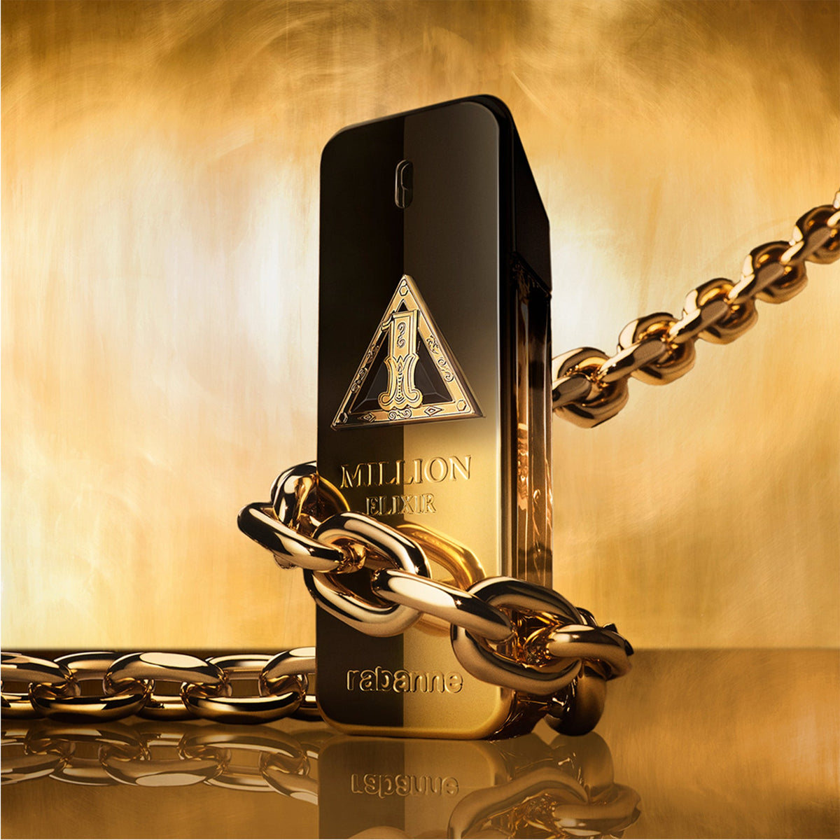 Rabanne 1 Million Night Elixir bottle with gold chain campaign styling