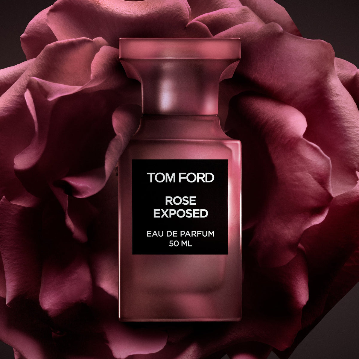 Tom Ford Rose Exposed 50ml bottle surrounded by rose petals
