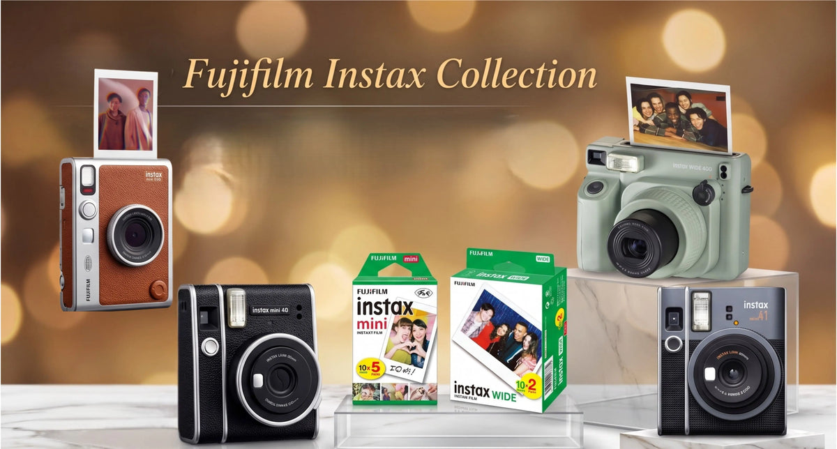 Fujifilm Instax instant cameras and film packs displayed on a premium marble surface with a warm, glowing bokeh background.