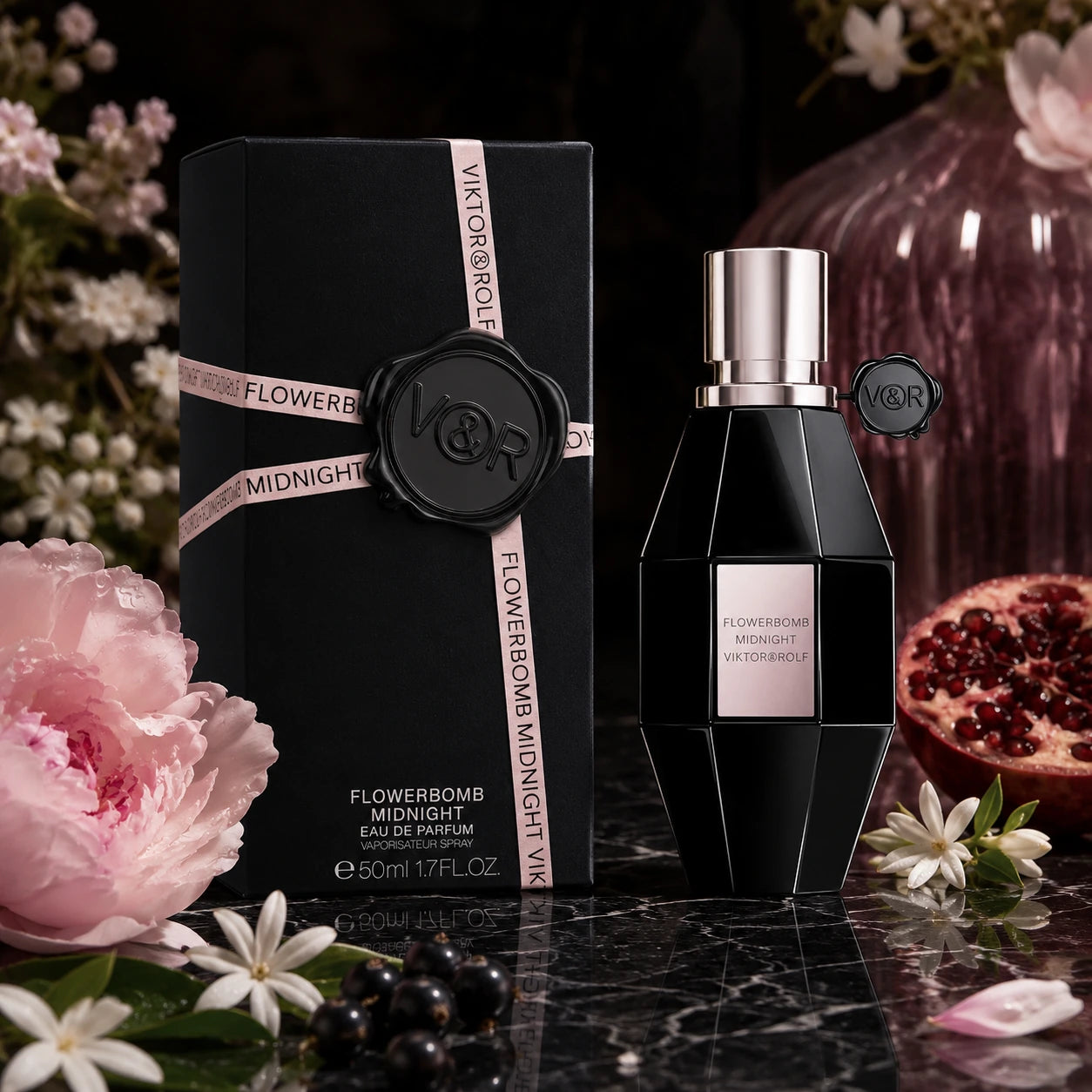Viktor & Rolf Flowerbomb Midnight EDP 50ml perfume bottle and box in a moody floral night setting for women.