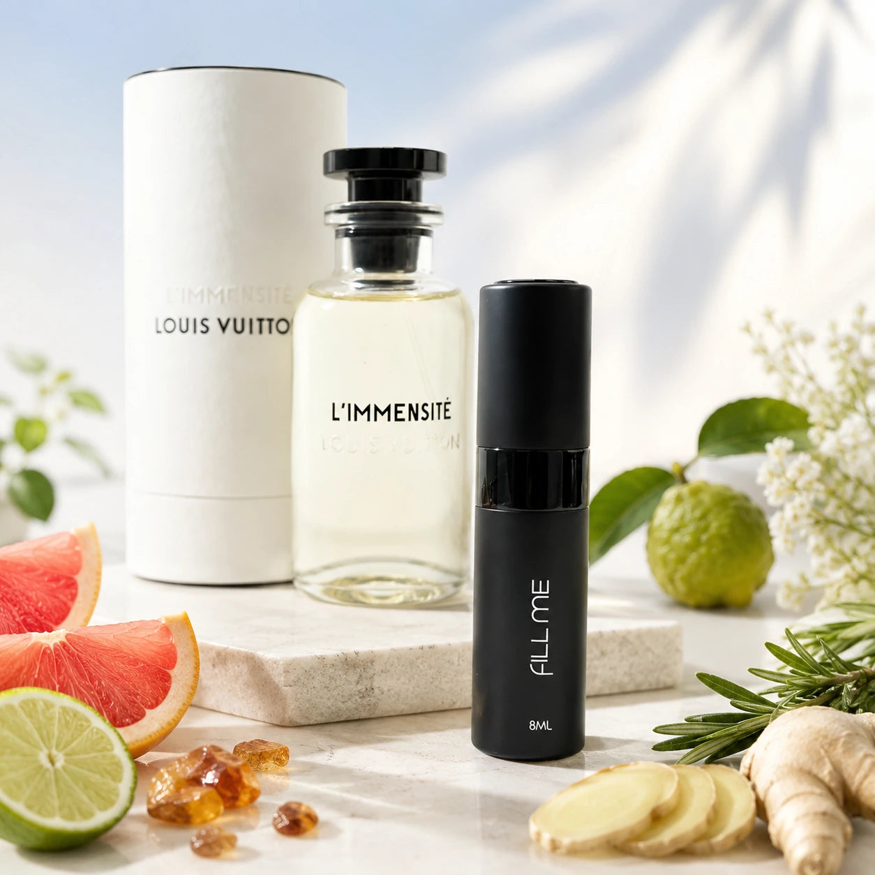 Louis Vuitton L'Immensité 8ml decant main hero image with Fill Me atomiser, full-size reference bottle and box, grapefruit, bergamot, ginger, rosemary and fresh aromatic notes at Gadgets Online NZ