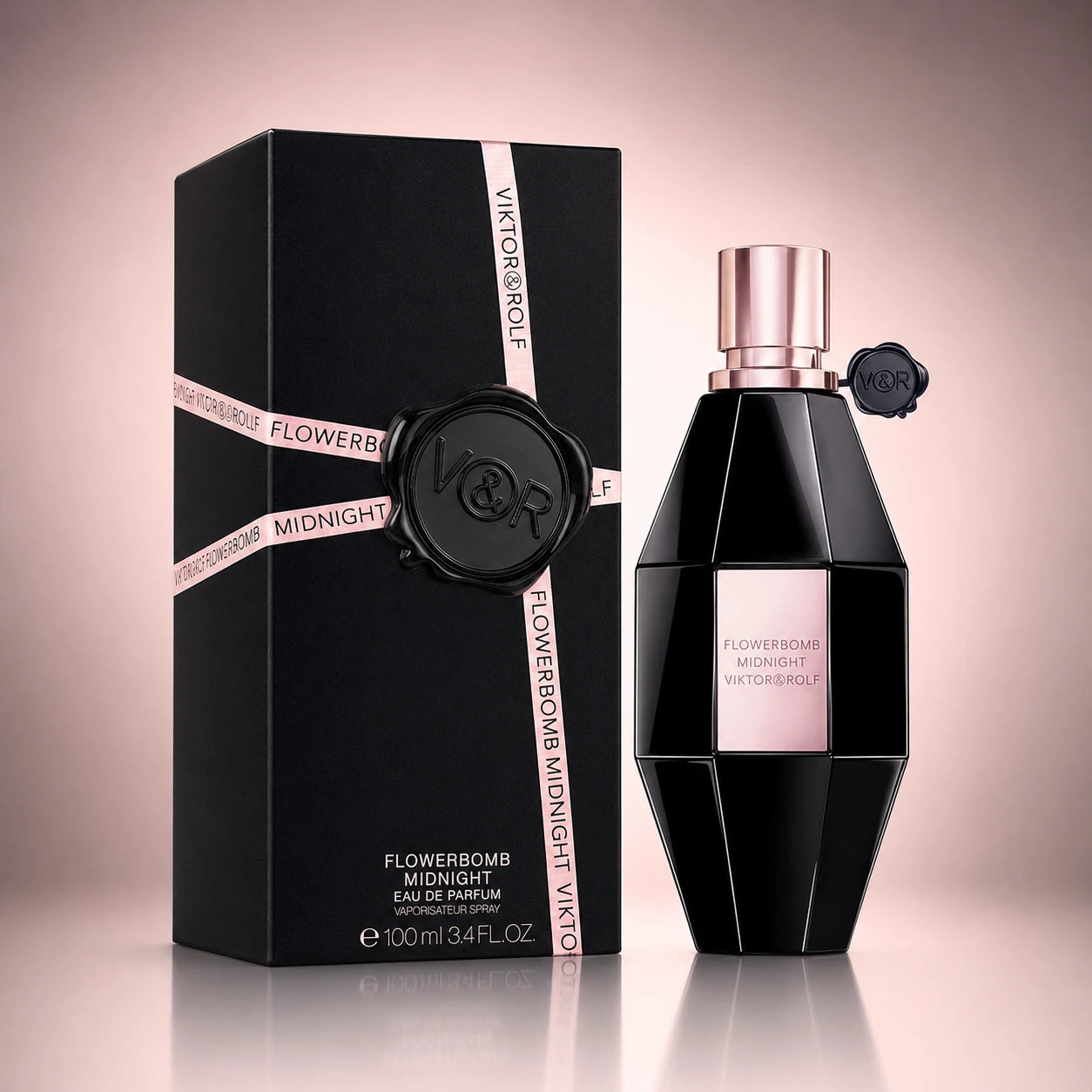 Viktor & Rolf Flowerbomb Midnight EDP 100ml bottle and box on a soft pink studio background