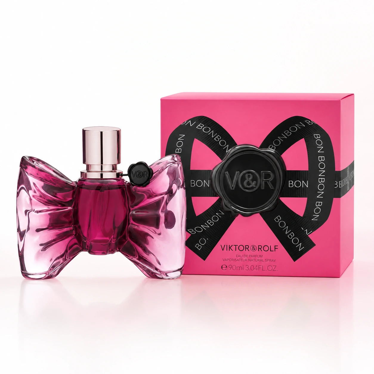 Viktor & Rolf Bonbon EDP 90ml for women clean product image showing the original pink bow-shaped perfume bottle and pink Bonbon box on a bright studio background.