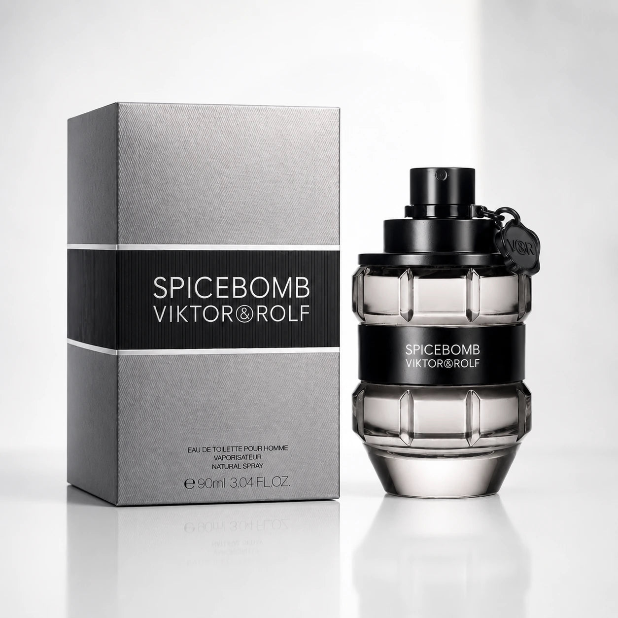 Clean ecommerce product image of Viktor & Rolf Spicebomb EDT 90ml for men showing the original bottle and box clearly on a refined minimal background.