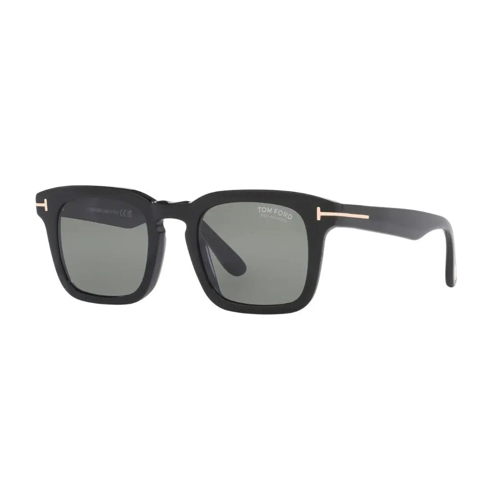 Tom Ford FT0751 Dax sunglasses for men featuring a bold square shiny black acetate frame.1 The grey polarized lenses are visible alongside the signature gold 'T' logo on the temples.