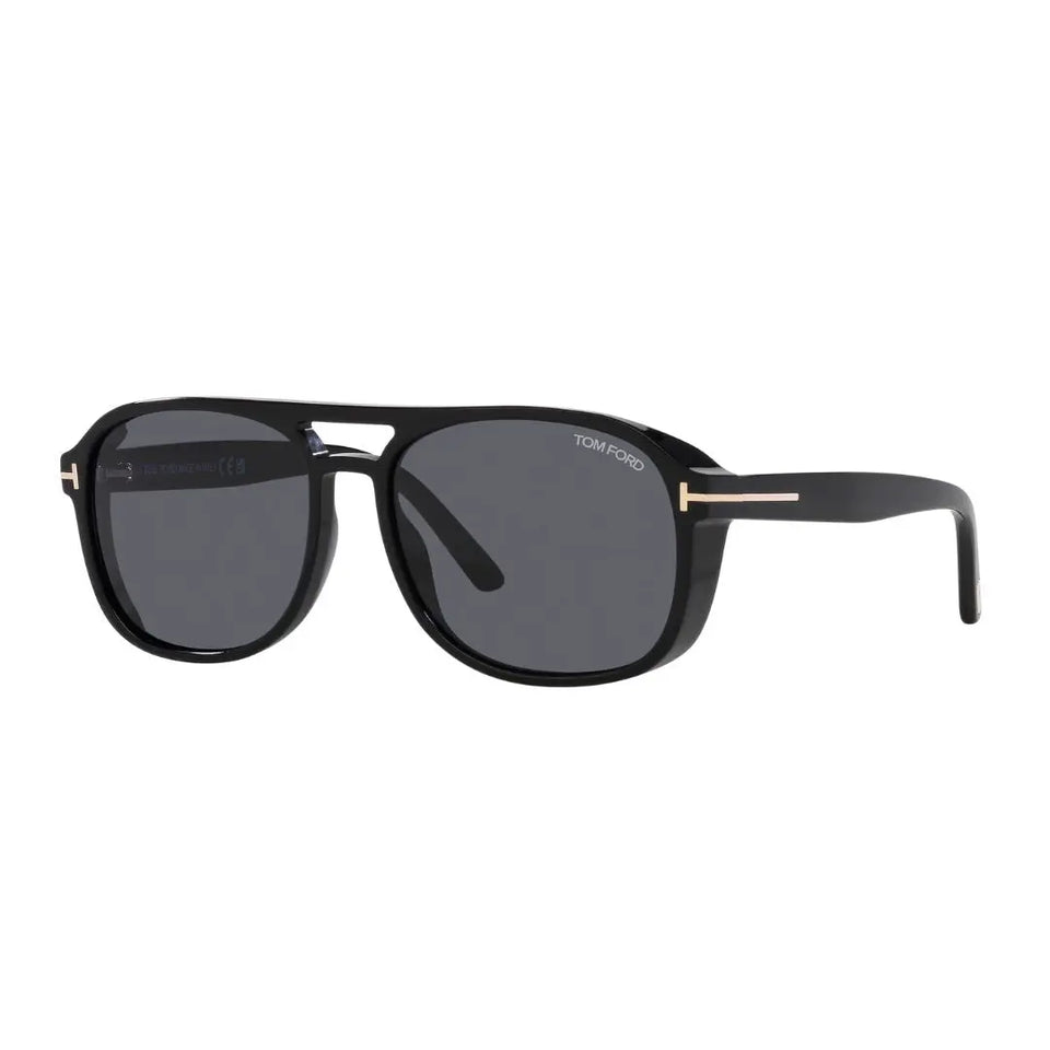 Tom Ford FT1022 Rosco sunglasses for men, featuring a polished shiny black square acetate frame. The solid smoke grey lenses are visible with the signature gold 'T' branding on the temples.