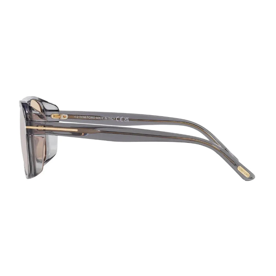 Side look Tom Ford FT1022 Rosco Sunglasses with a gray frame and gold accents on a white background