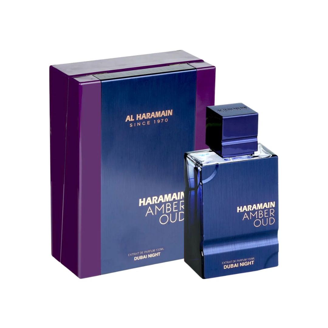 Al Haramain Amber Oud Dubai Night Extrait De Parfum 75ml, a sleek, dark black and gold bottle, suggesting a rich, dark, smoky oriental scent with notes of saffron, rose, and amber.