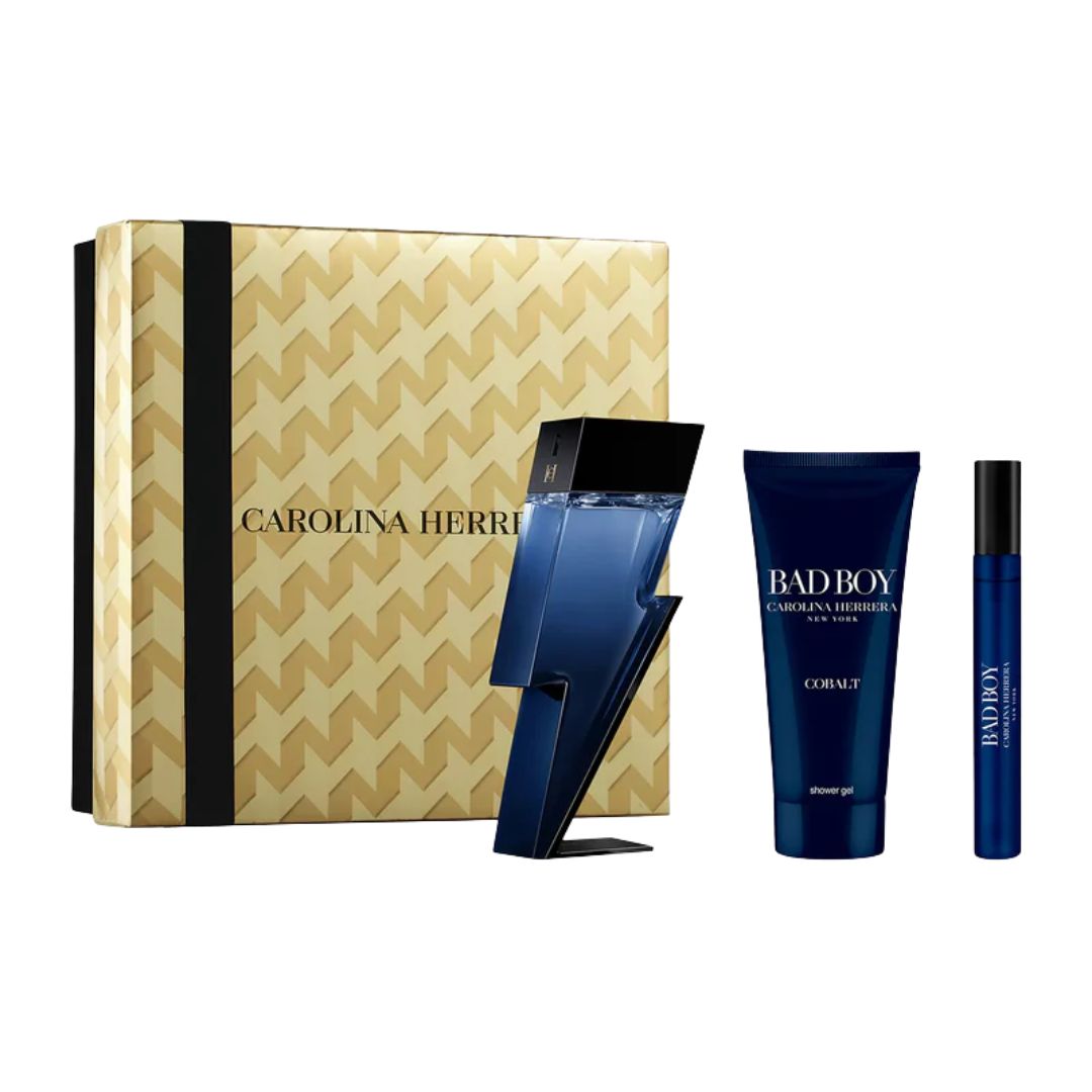 Carolina Herrera Bad Boy Cobalt 3pc Gift Set, a vibrant blue and silver box containing the iconic lightning bolt 100ml EDP, a 10ml travel spray, and a 100ml shower gel, suggesting a fresh, modern aromatic men's scent.
