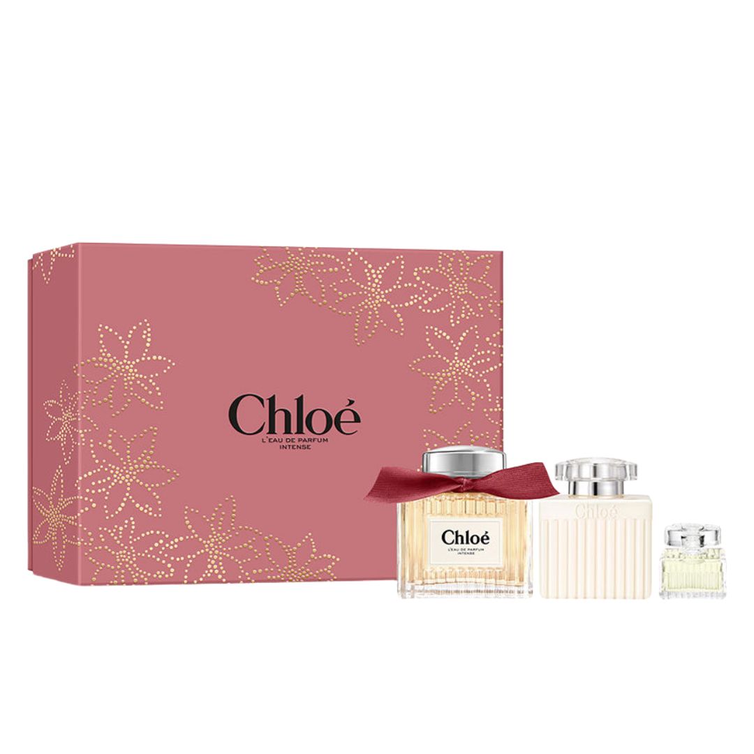 Chloé Eau de Parfum Intense 100ml perfume set with pink packaging and three bottles on a white background