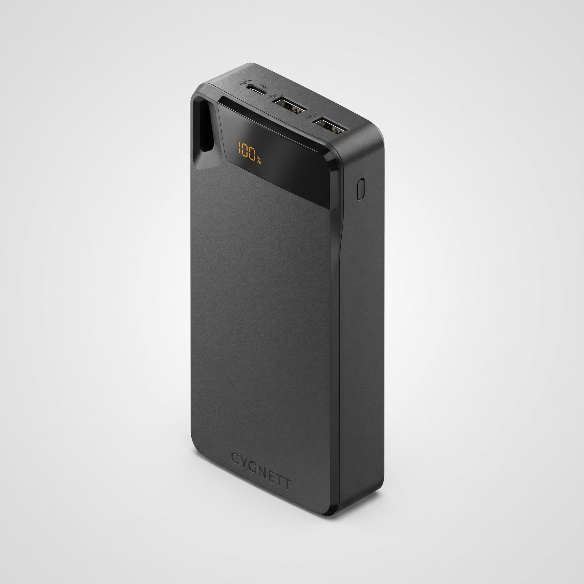 A black CYGNETT portable power bank with a digital display showing 100% battery level, photographed on a clean light gray background.