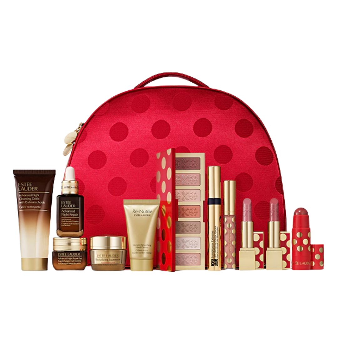 Estée Lauder 11-Piece Holiday Beauty Gift Set 2025, with a luxurious train case filled with 5 full-size products and more skincare and makeup favorites. Estée Lauder beauty set with red polka dot bag on a white background