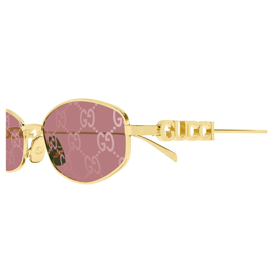 Side view of Gucci GG1802S sunglasses showing gold metal temples with bold cut-out Gucci lettering - Gadgets Online NZ