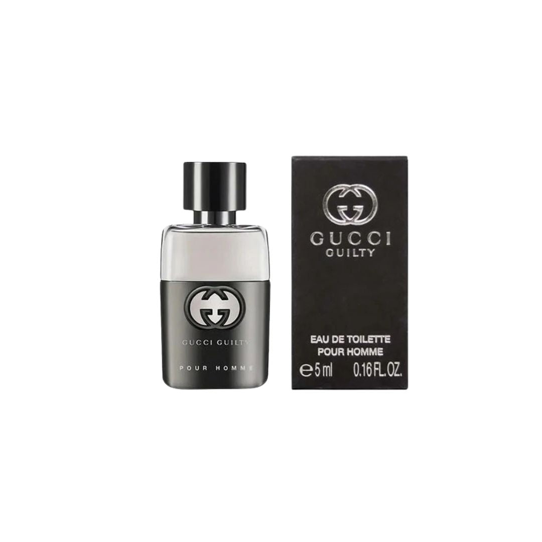 Gucci Guilty Pour Homme 5ml EDT, a sleek, dark bottle with the Gucci logo, suggesting a fresh, aromatic, and woody masculine fragrance.