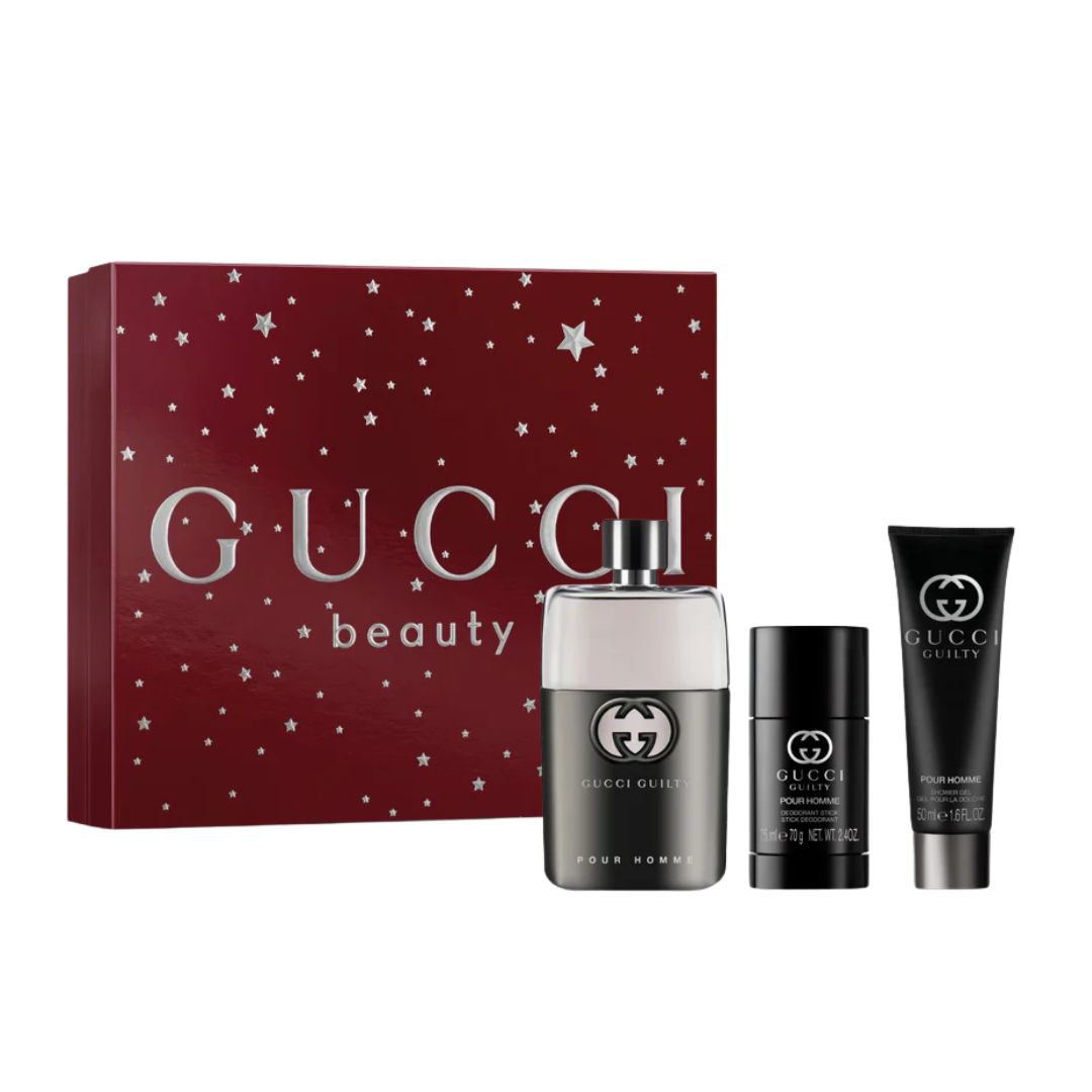 Gucci Guilty Pour Homme 3pc Gift Set, a sleek dark box containing the 90ml EDT bottle, 50ml Shower Gel, and 75ml Deodorant Stick, suggesting a classic aromatic citrus and woody men's scent.