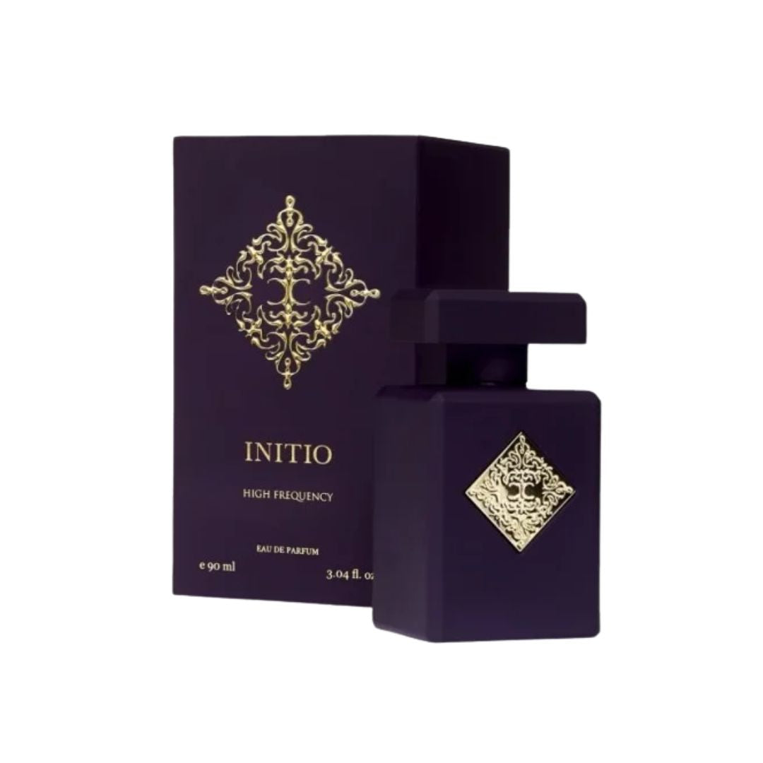 Initio Parfums Prives High Frequency 90ml EDP, a sleek, dark bottle with an intricate gold geometric emblem, suggesting a bright, floral, and magnetic unisex fragrance.