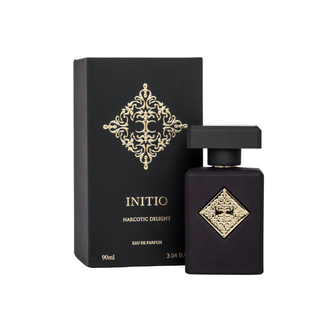 Initio Parfums Prives Narcotic Delight 90ml EDP, a sleek, dark bottle with an intricate gold geometric emblem, suggesting an intoxicating, boozy, and gourmand unisex fragrance.