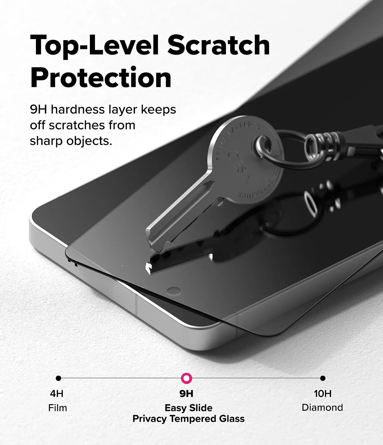 Smartphone with privacy tempered glass screen protector and keychain, highlighting scratch protection.