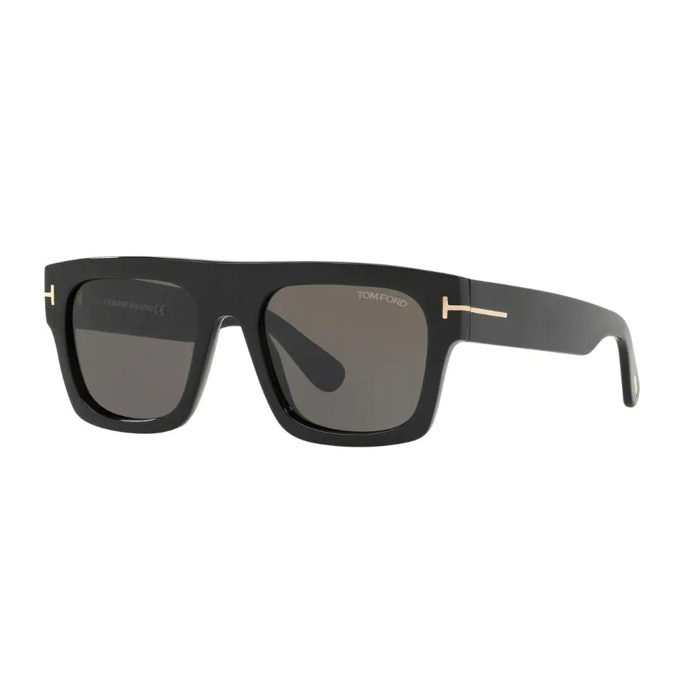 Tom Ford FT0711 sunglasses for men featuring a shiny black acetate rectangle frame. The smoke grey solid lenses are complemented by the signature gold 'T' logo at the temples.