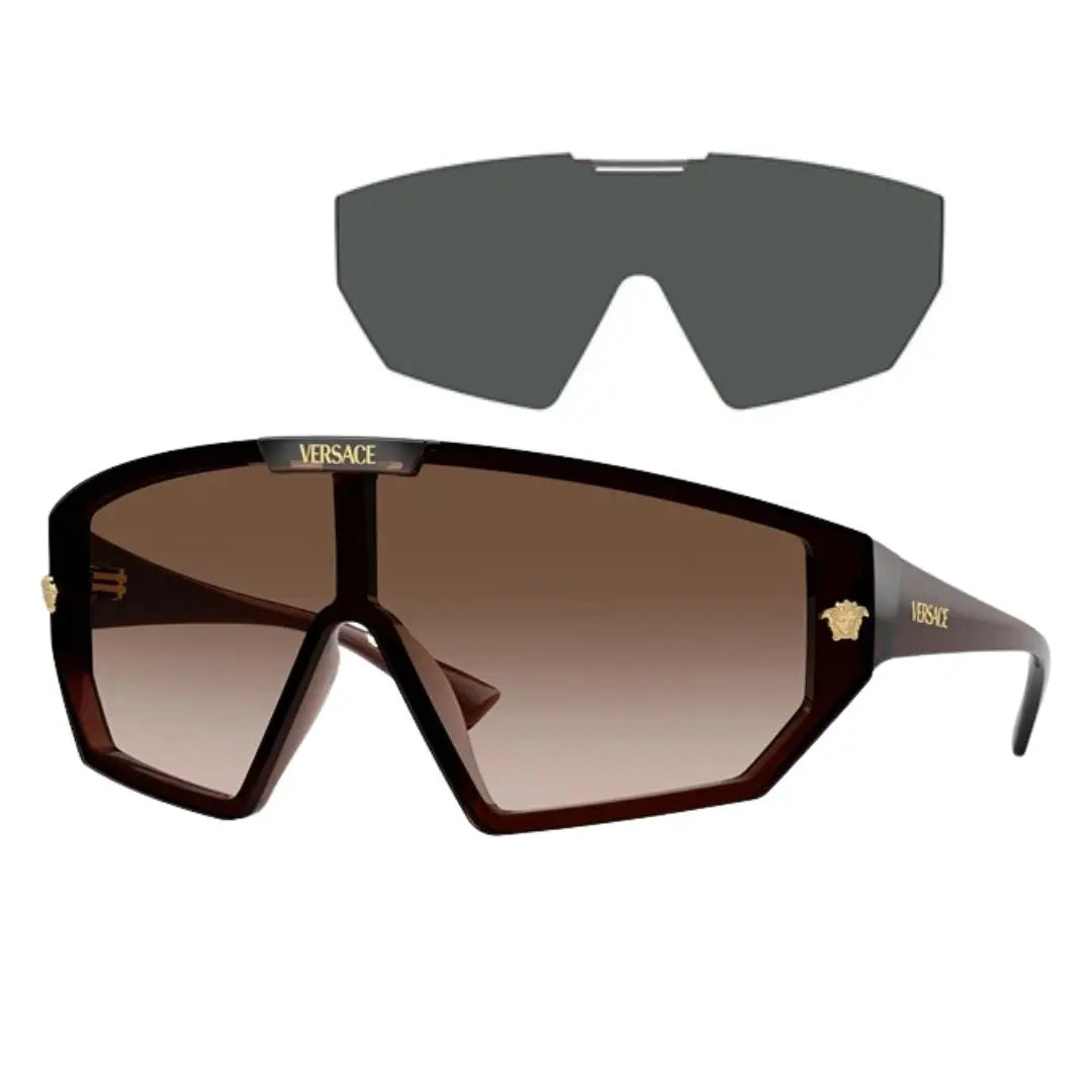 Versace VE4461 533213 shield sunglasses with grey interchangeable lenses in transparent brown with brown gradient lenses and gold Medusa - Gadgets Online NZ