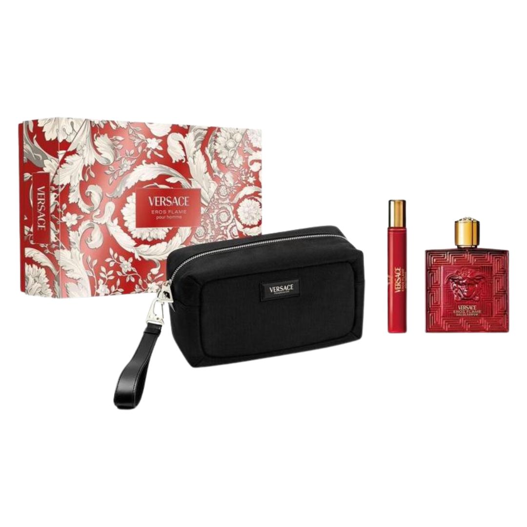 Versace gift set featuring a red and white patterned box, a black zippered pouch with wrist strap, a red perfume atomizer, and a red perfume bottle with gold caps on a white background.