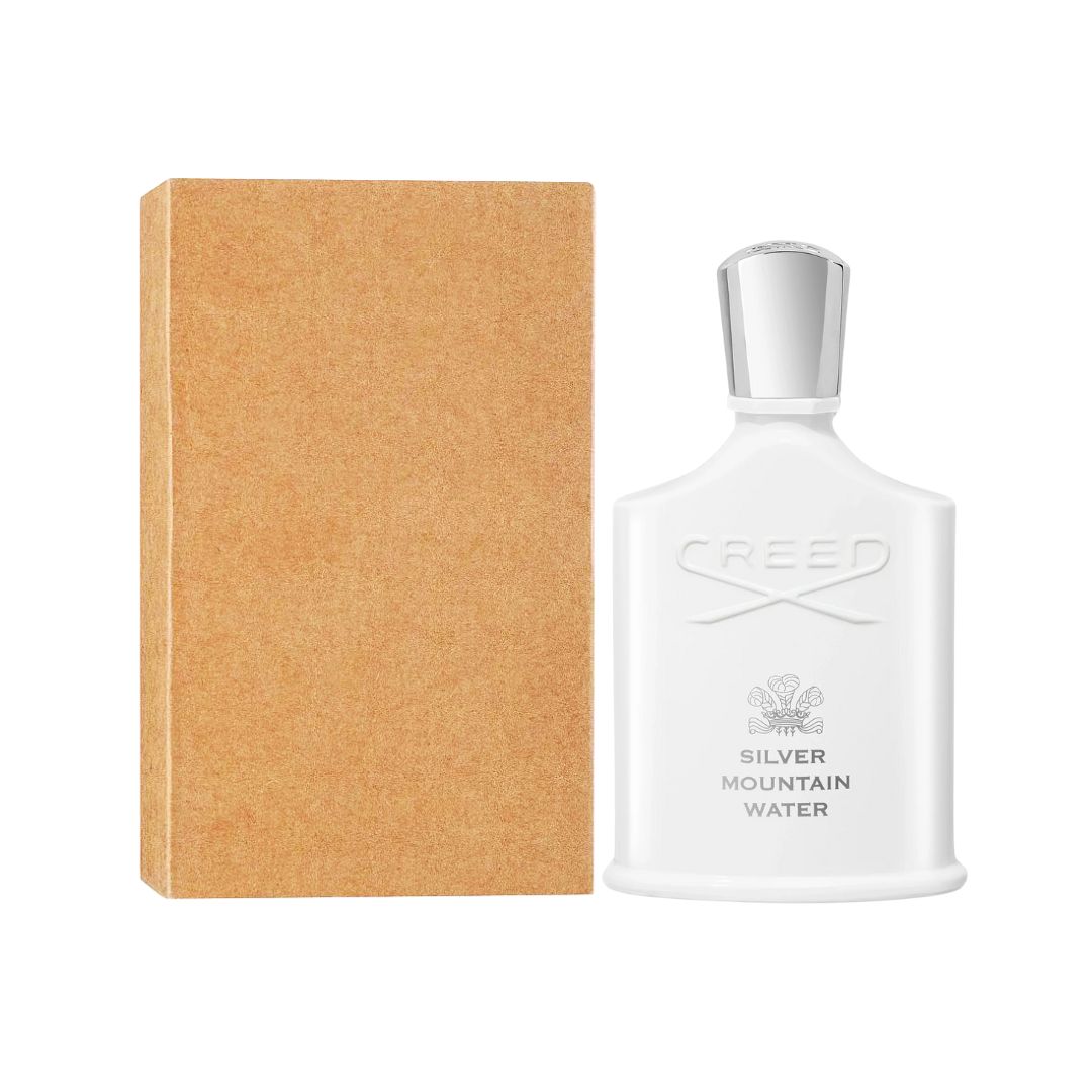 Creed Silver Mountain Water EDP 100ml White Creed perfume bottle with silver cap next to a brown box on a white background